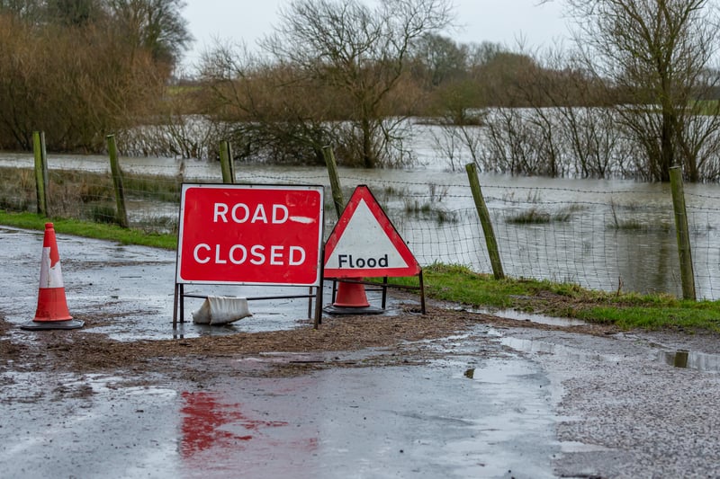 Road closed sign due to localised flooding in UK